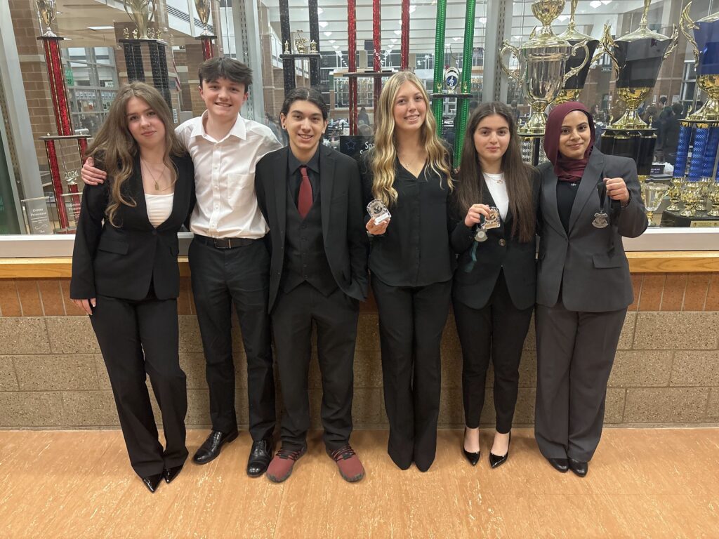 LSE debaters who won awards in front of the LSW trophy case